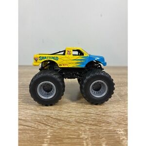 Hot Wheels Monster Jam Shattered Monster Truck Yellow Blue Diecast